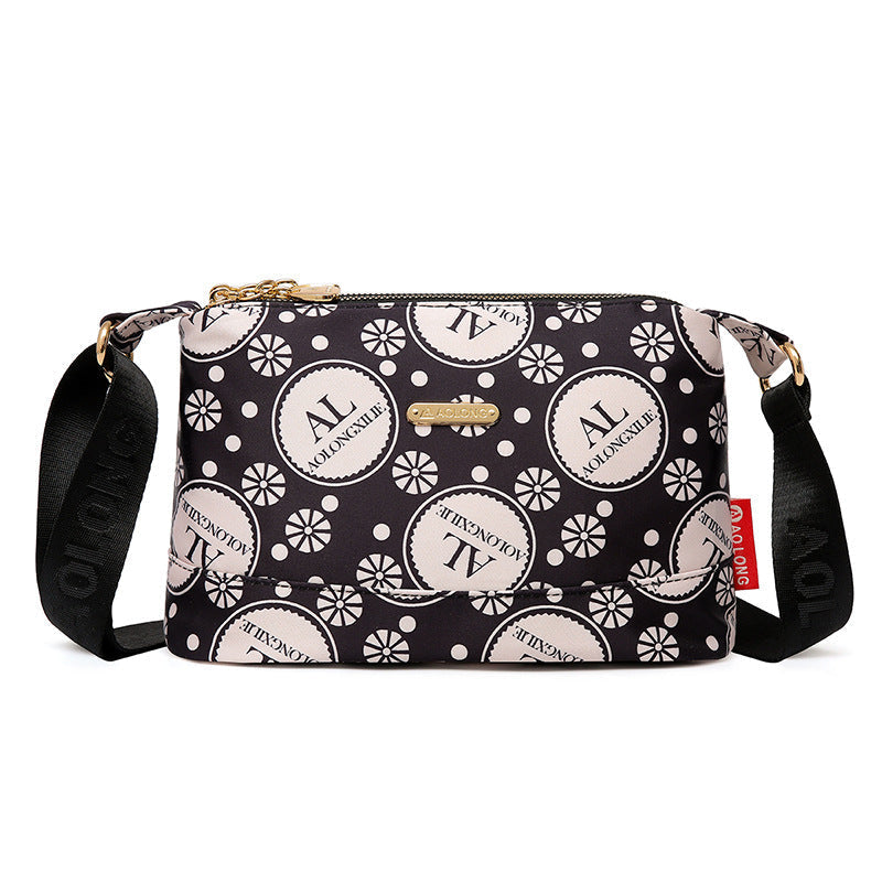 Sac à bandoulière chic en cuir avec multiples poches pour femme, design élégant et pratique
