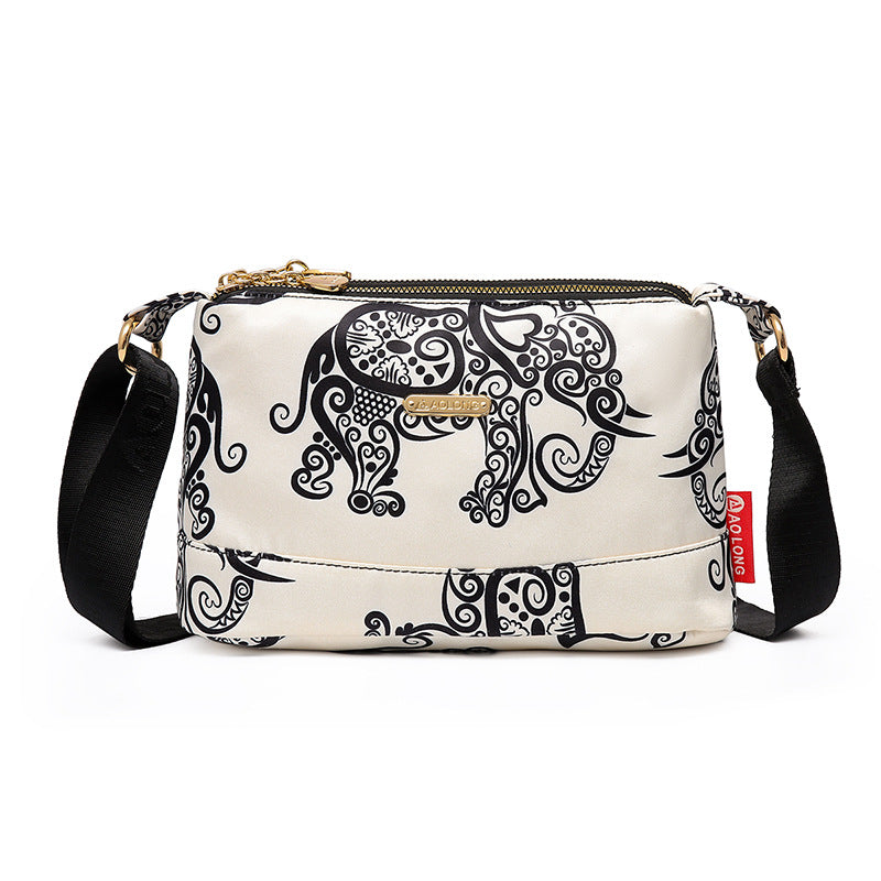 Sac à bandoulière chic en cuir avec multiples poches pour femme, design élégant et pratique