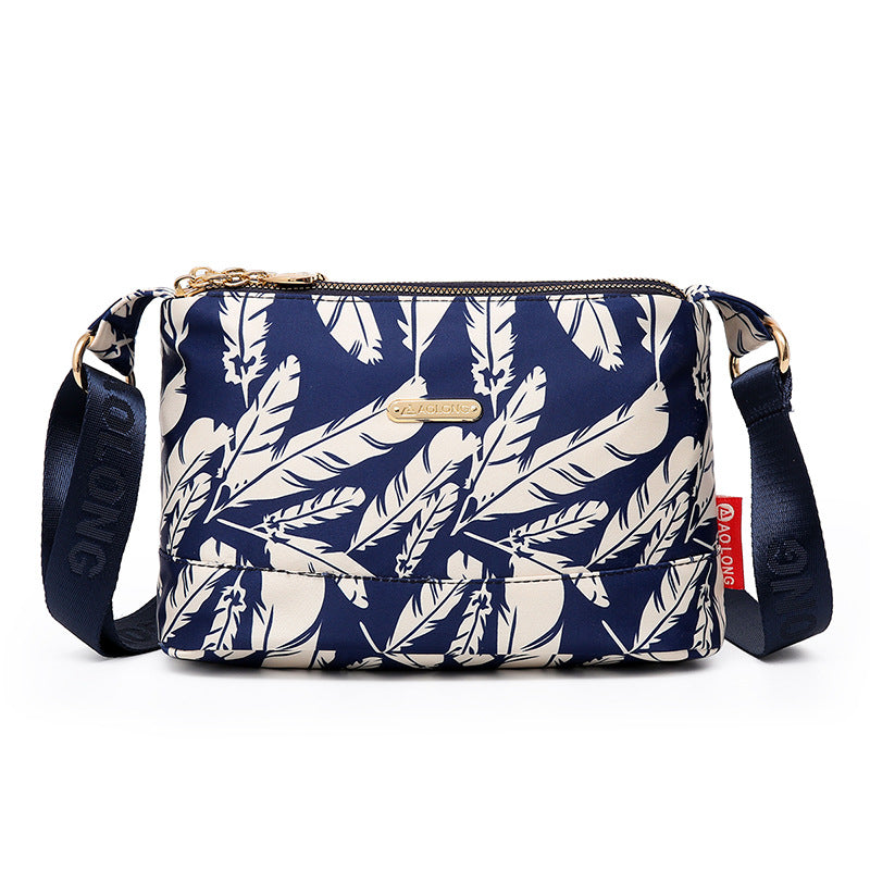 Sac à bandoulière chic en cuir avec multiples poches pour femme, design élégant et pratique