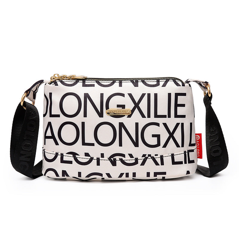 Sac à bandoulière chic en cuir avec multiples poches pour femme, design élégant et pratique