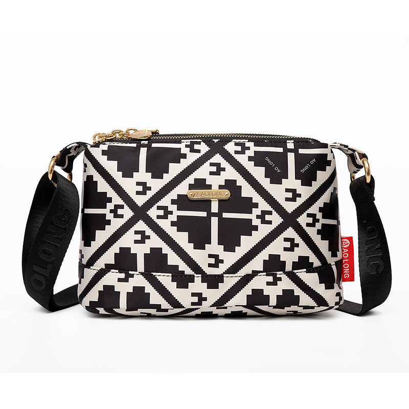 Sac à bandoulière chic en cuir avec multiples poches pour femme, design élégant et pratique