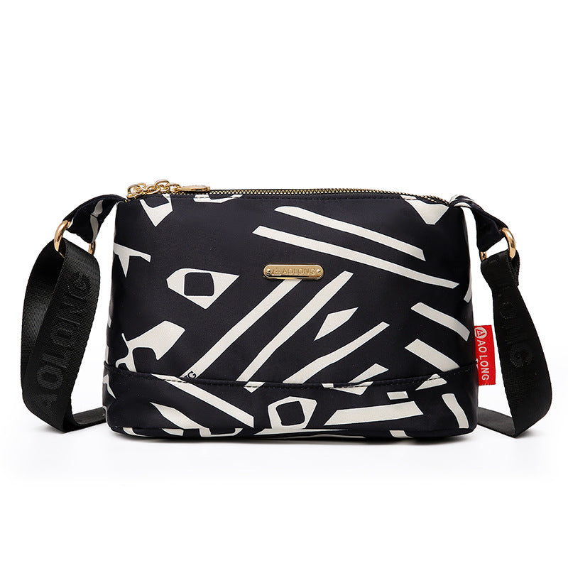 Sac à bandoulière chic en cuir avec multiples poches pour femme, design élégant et pratique