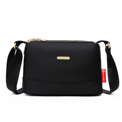 Sac à bandoulière chic en cuir avec multiples poches pour femme, design élégant et pratique